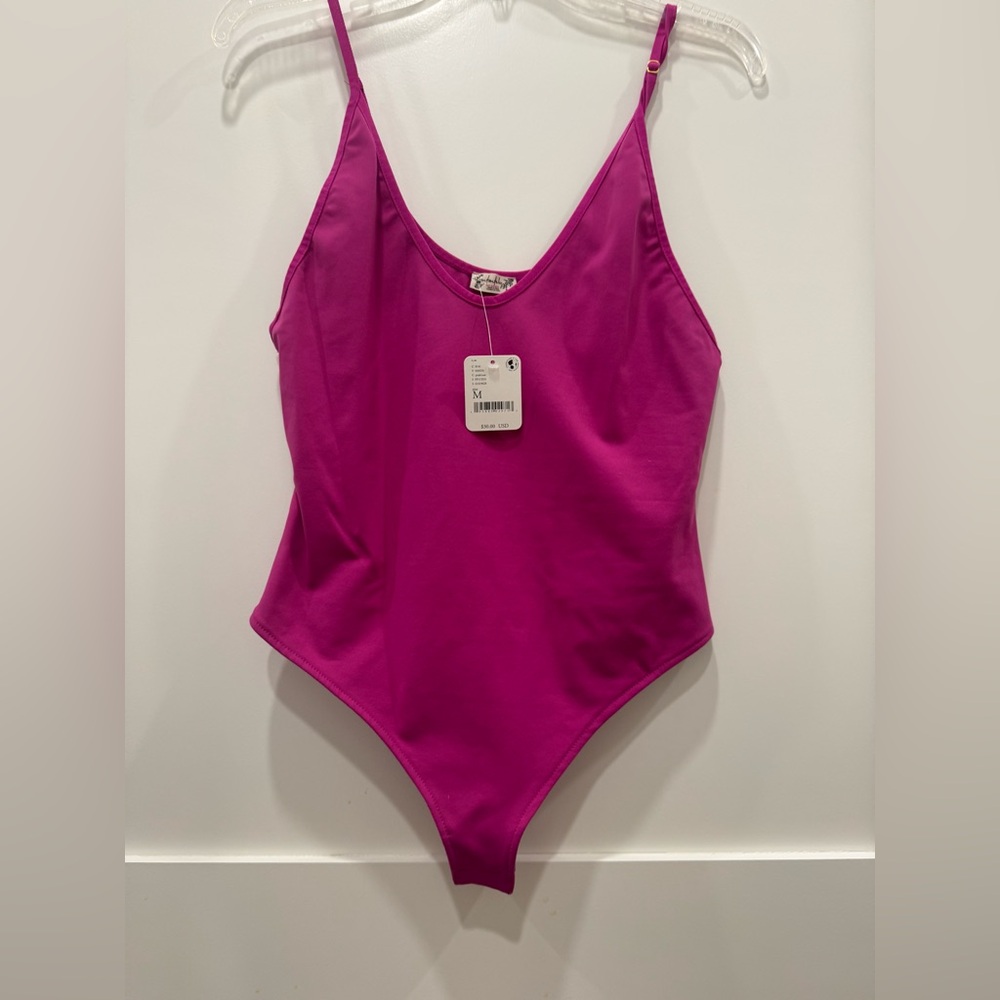 Free people NWT vibrant fuschia body suit